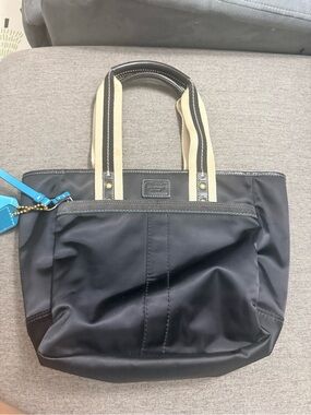 Coach Hampton Black Nylon Tote leather trimmed with Striped Handles